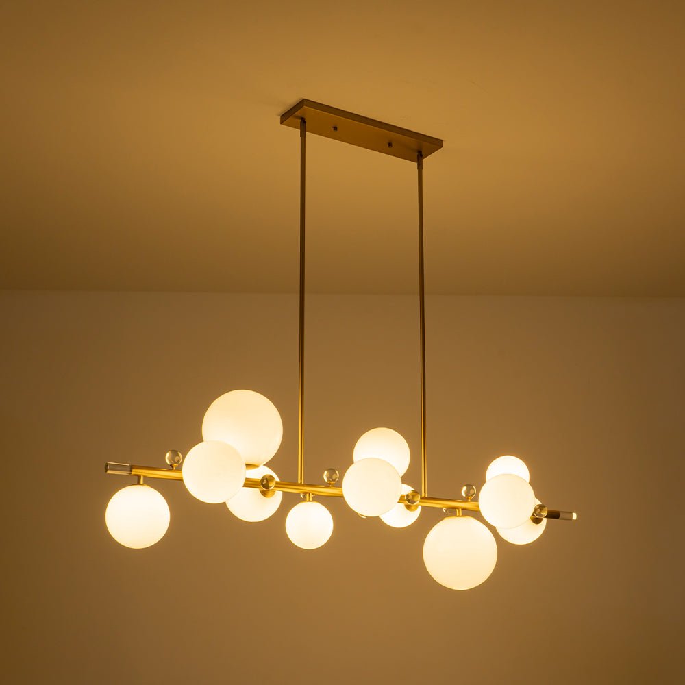 lightfixturesusa-glam-12-light-shine-opal-glass-globe-linear-island-chandelier-chandelier-brass-529131